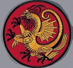 Broderat drakemärke